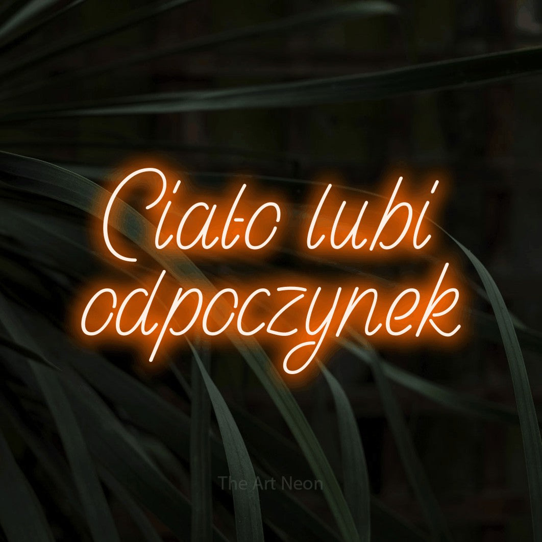 LED neon sign reading “Ciało lubi odpoczynek”, arranged in two lines.