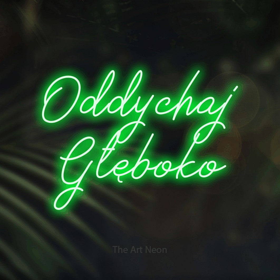 LED neon sign reading “Oddychaj Głęboko”, arranged in two lines.