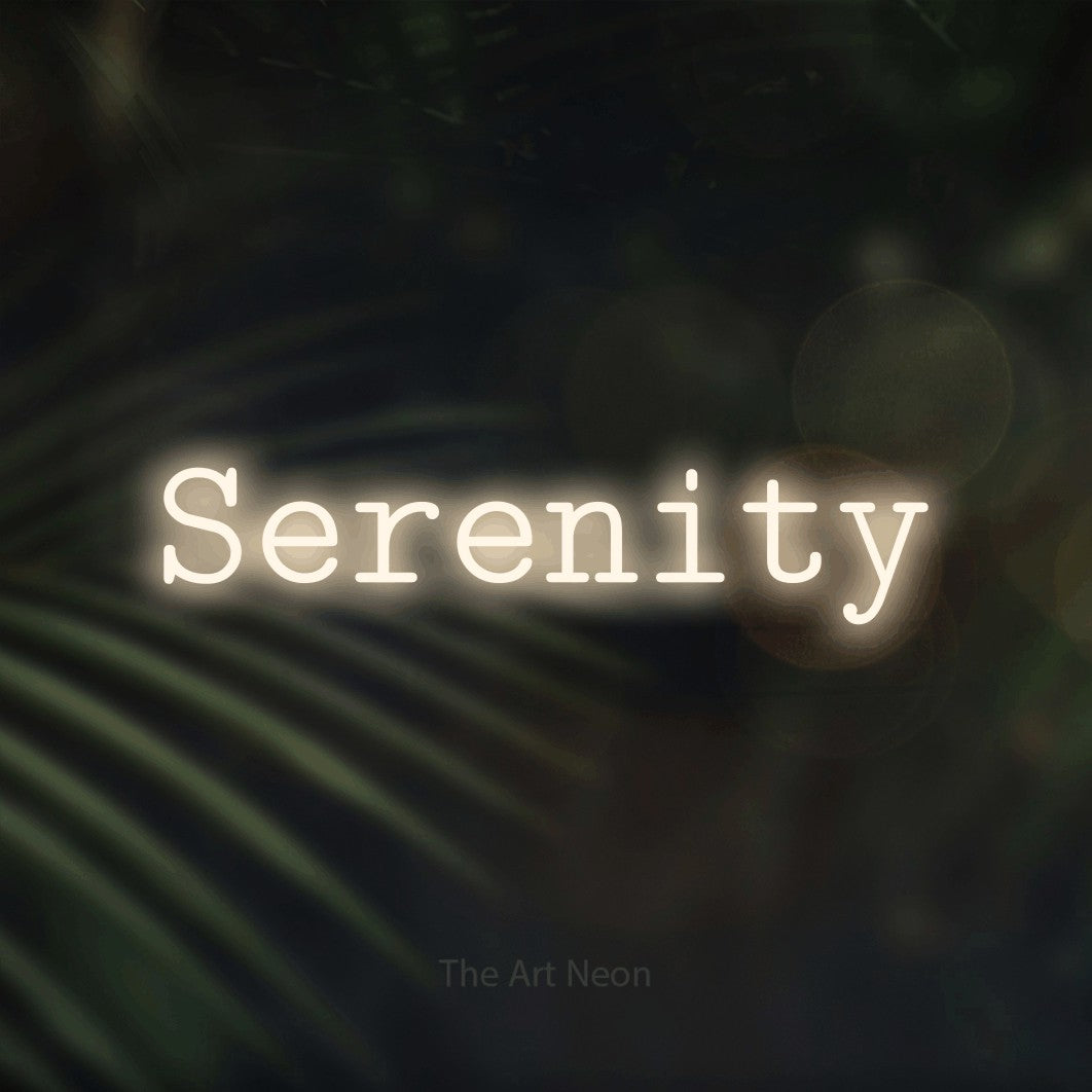 LED neon sign reading “Serenity”, arranged in a single line.