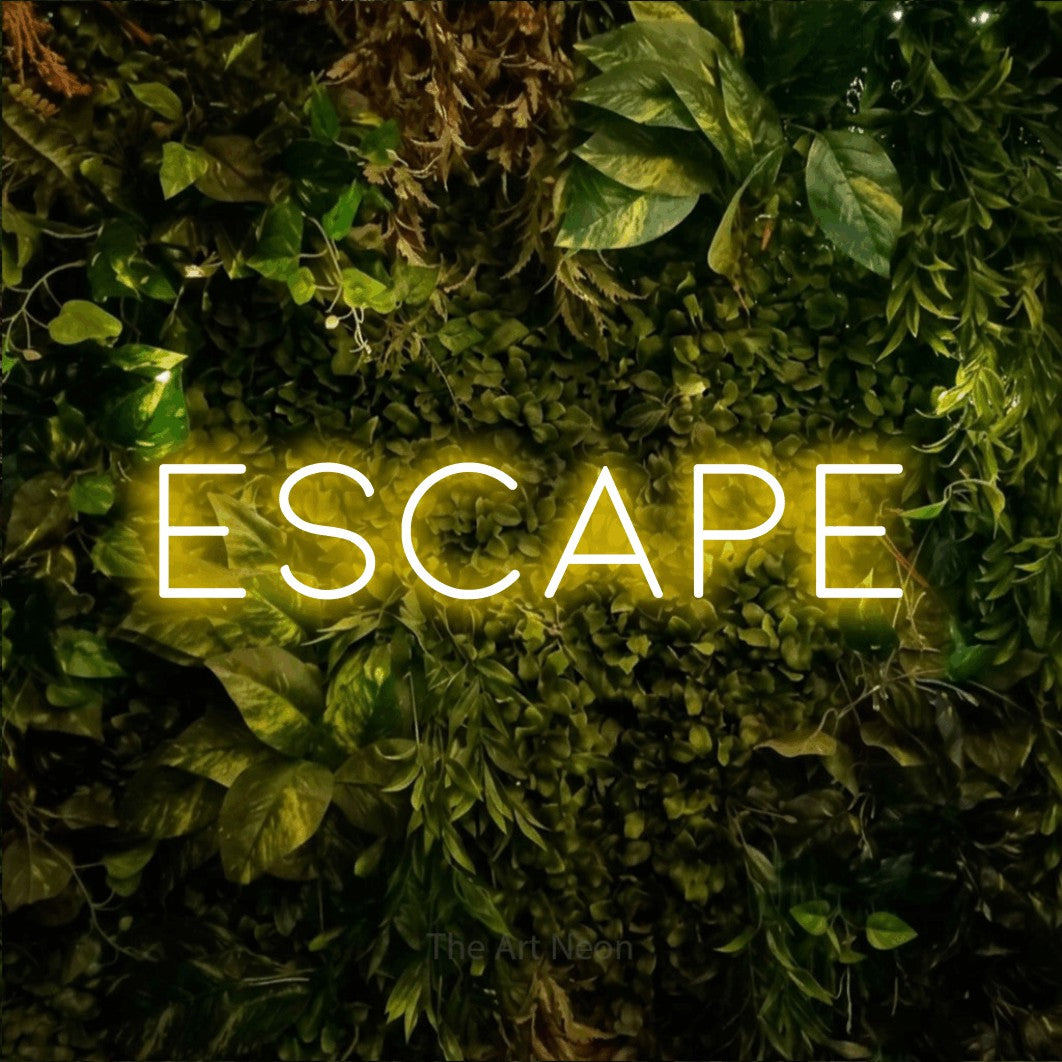 LED neon sign reading “ESCAPE”, arranged in a single line.