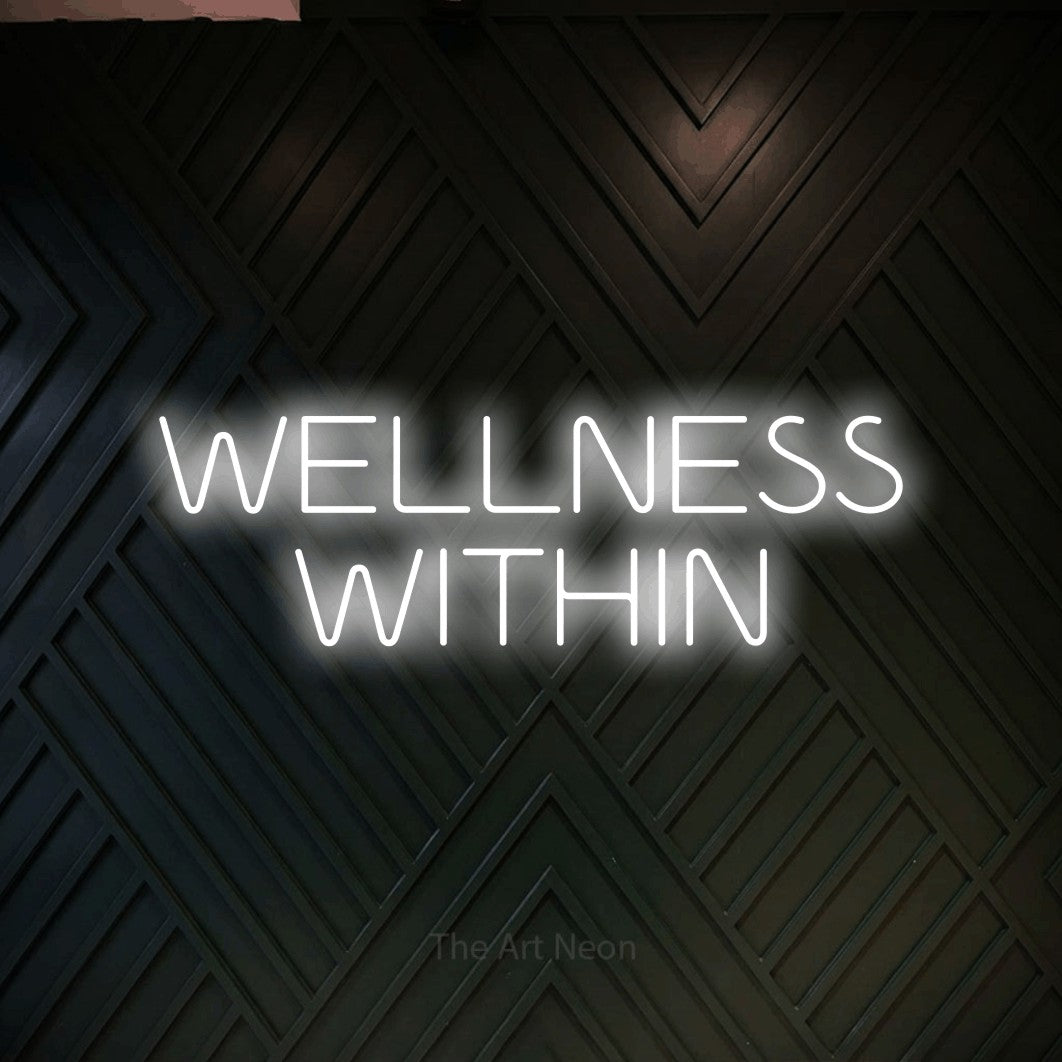 LED neon sign reading “WELLNESS WITHIN”, arranged in two lines.