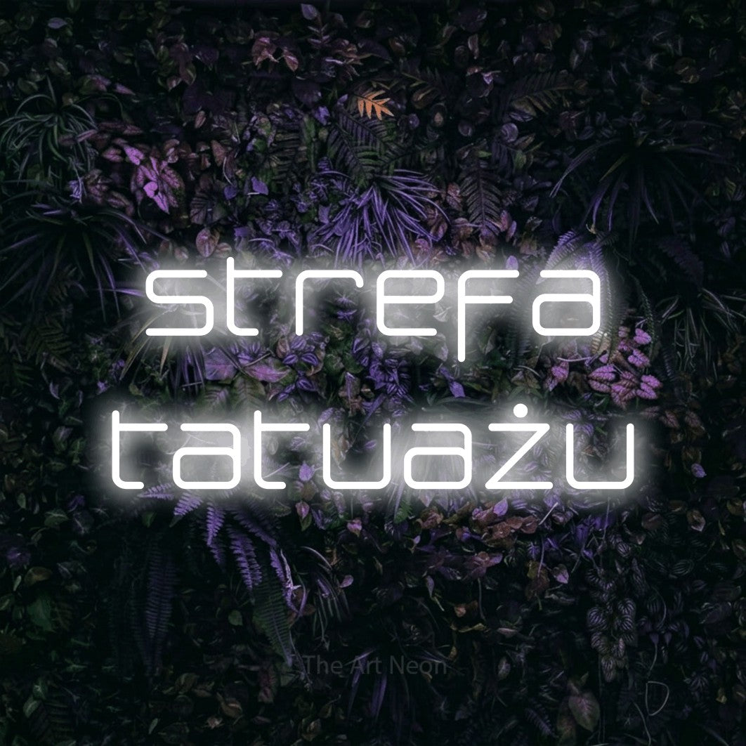 LED neon sign reading “strefa tatuażu”, arranged in two lines.