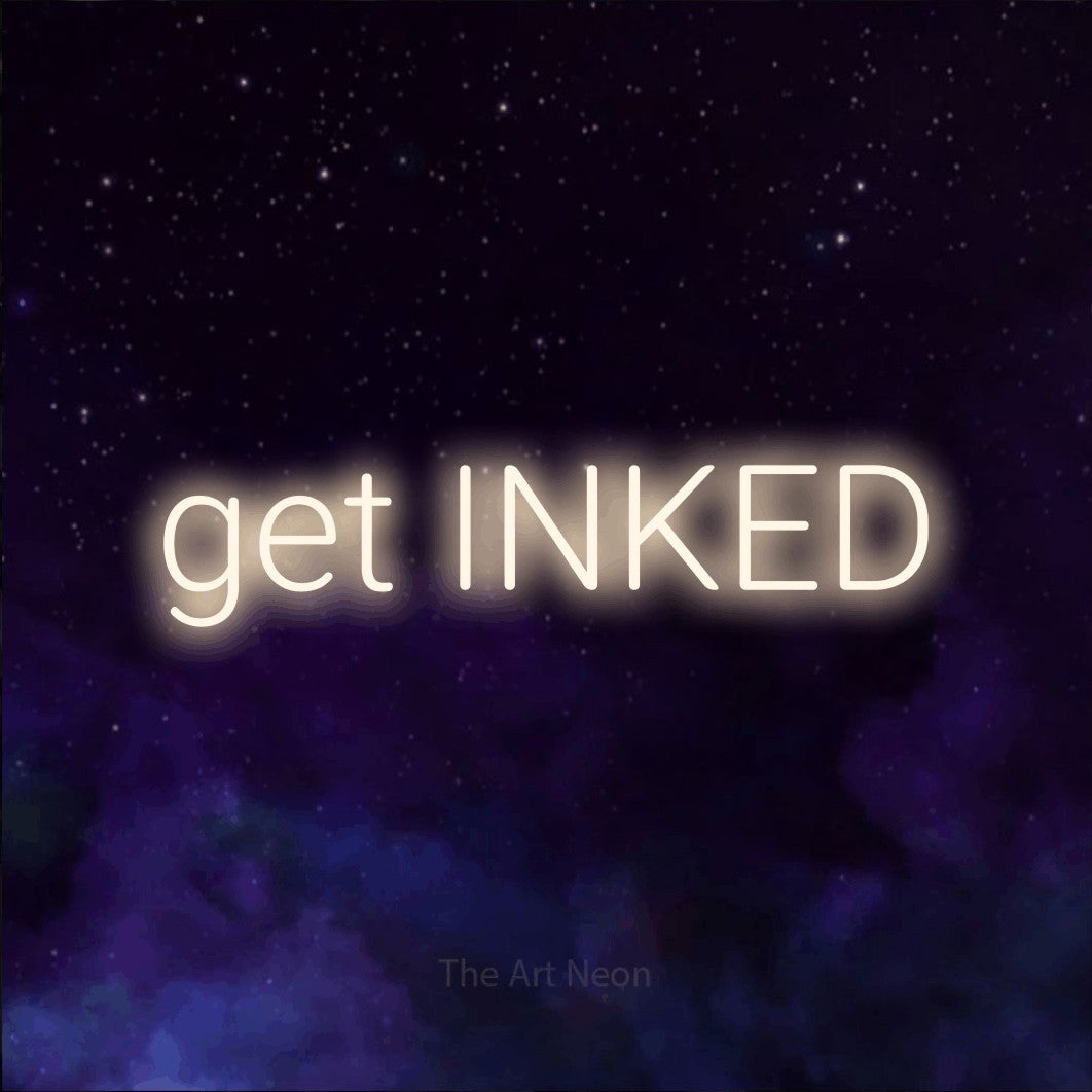 LED neon sign reading “get INKED”, arranged in a single line.