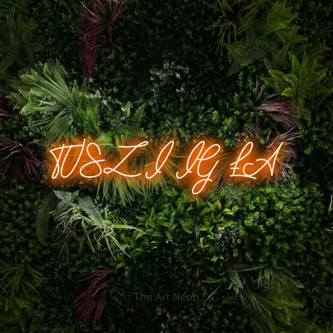 LED neon sign reading “TUSZ I IGŁA”, arranged in a single line.