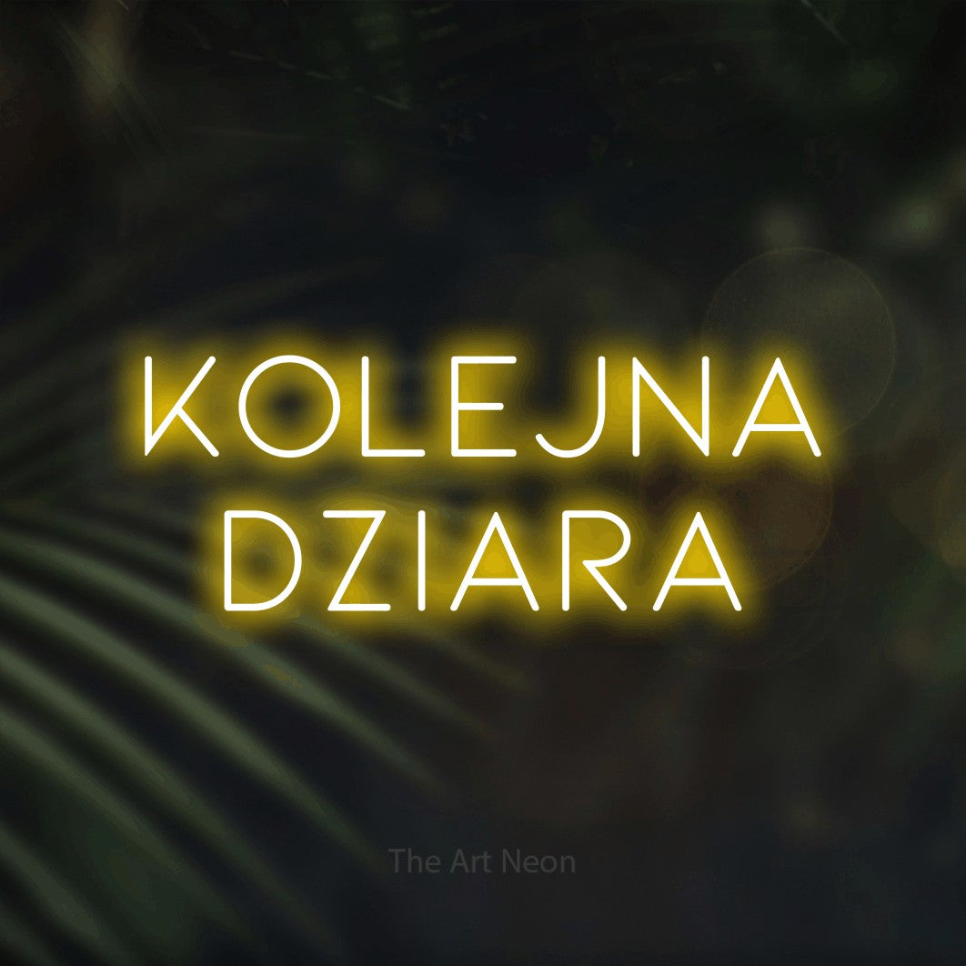 LED neon sign reading “KOLEJNA dziara”, arranged in two lines.