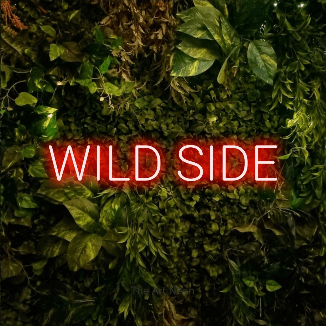 LED neon sign reading “WILD SIDE”, arranged in a single line.