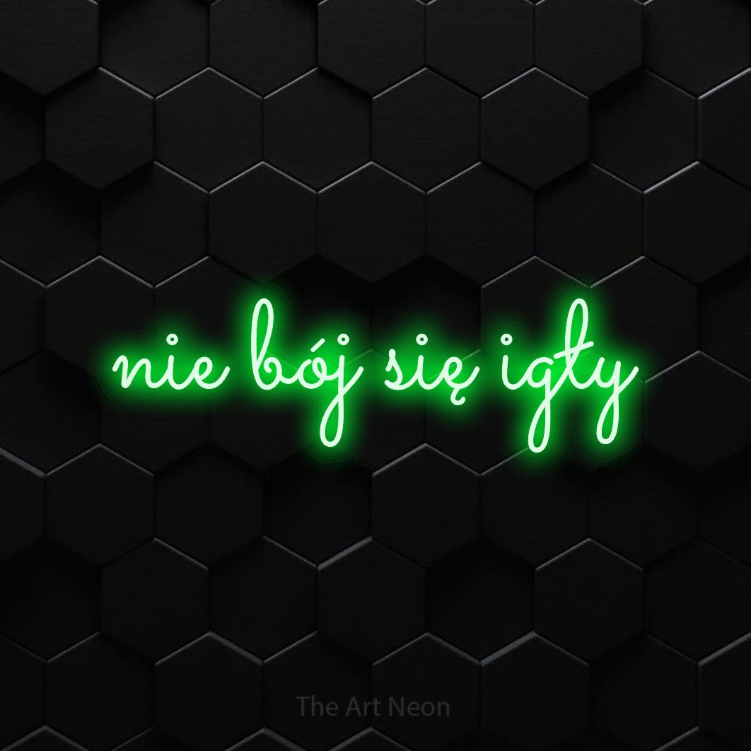 LED neon sign reading “nie bój się igły”, arranged in a single line.