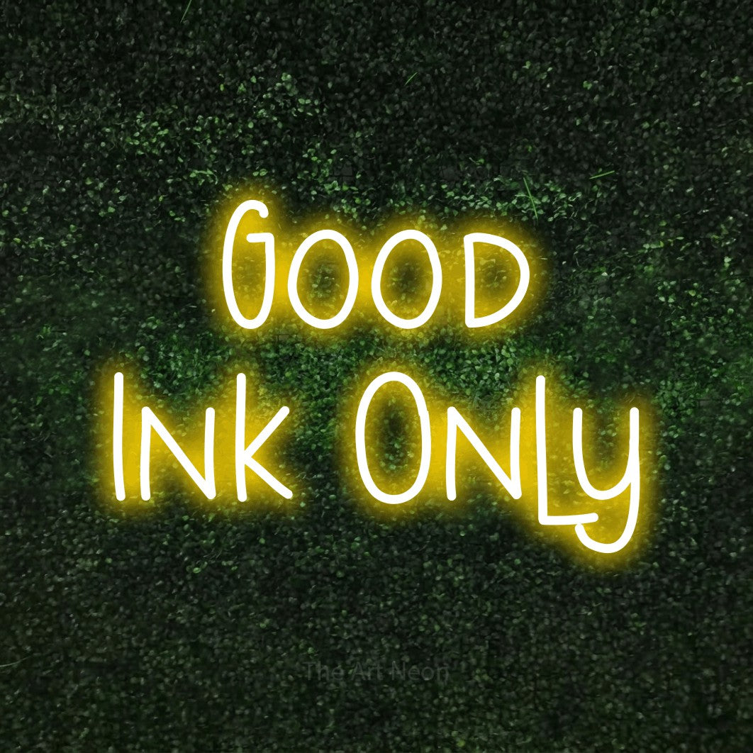 LED neon sign reading “Good Ink Only”, arranged in two lines.