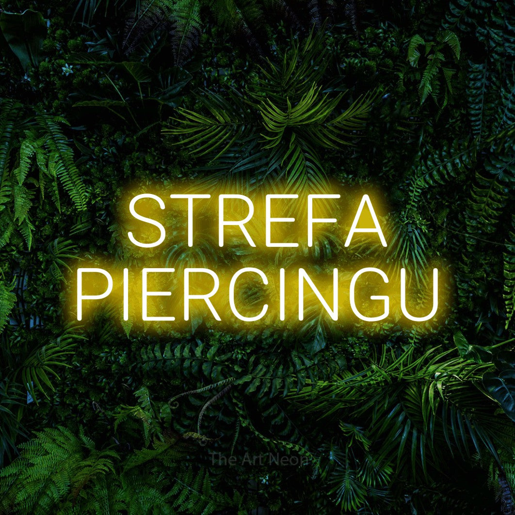 LED neon sign reading “STREFA PIERCINGU”, arranged in two lines.