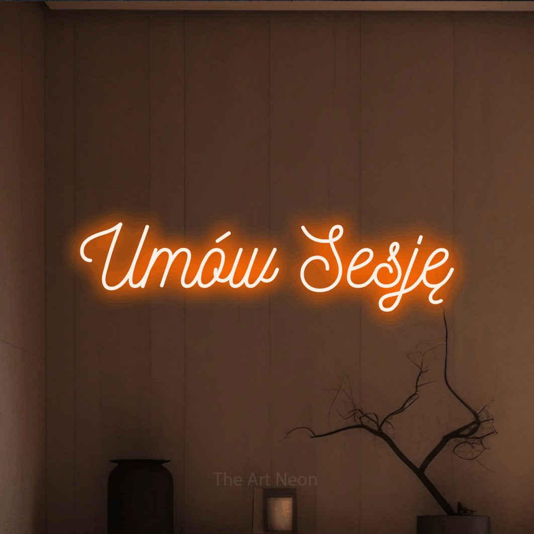LED neon sign reading “Umów Sesję”, arranged in a single line.
