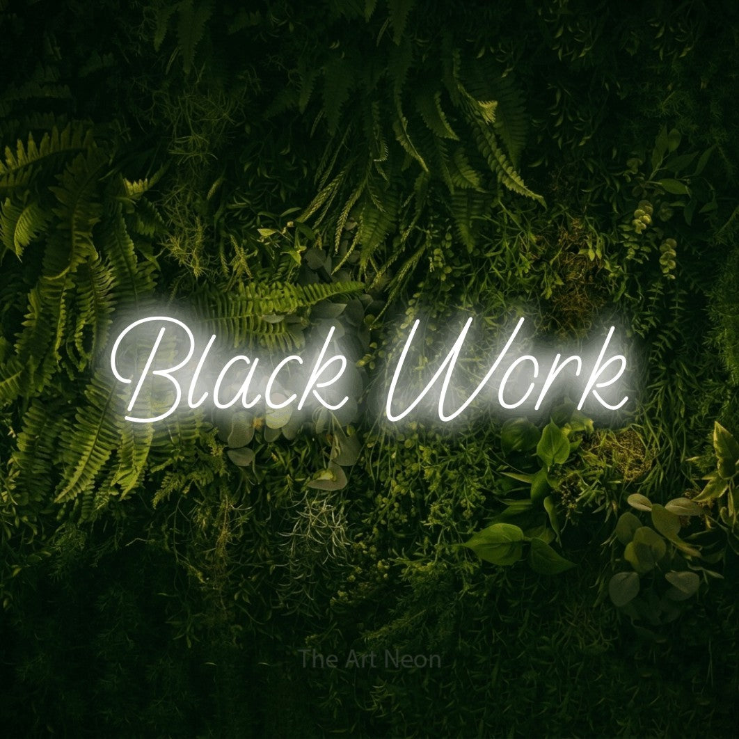 LED neon sign reading “Black Work”, arranged in a single line.