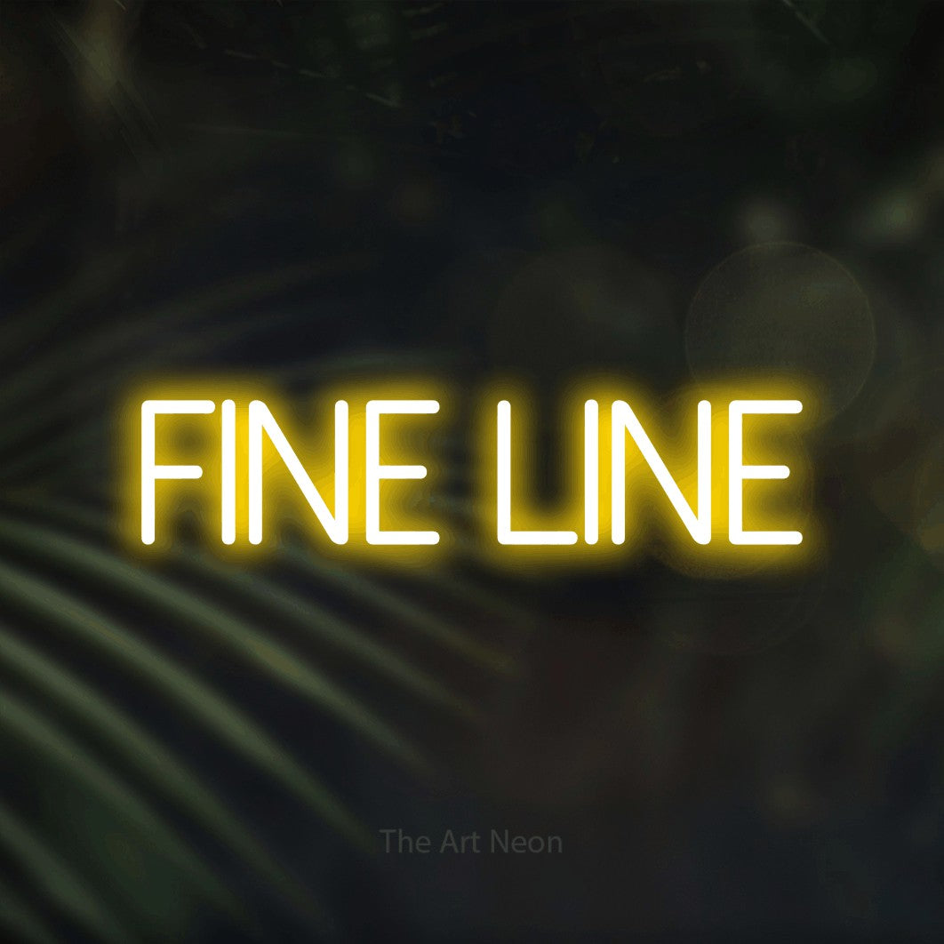 LED neon sign reading “Fine Line”, arranged in a single line.