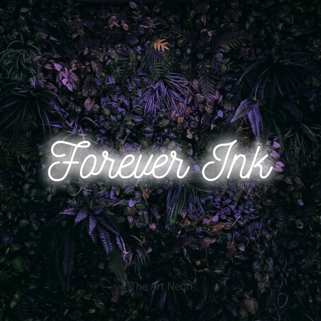 LED neon sign reading “Forever Ink”, arranged in a single line.