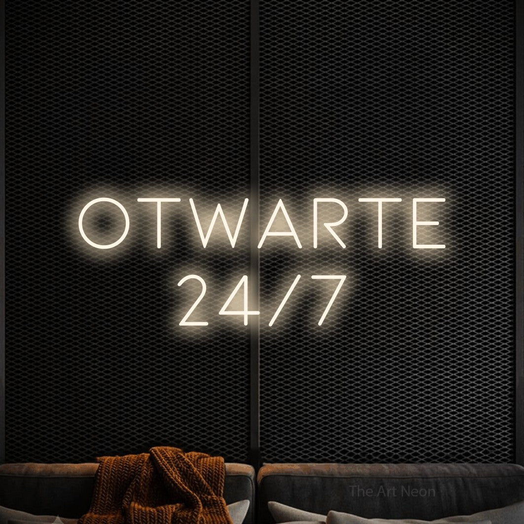 LED neon sign reading “OTWARTE 24/7”, arranged in two lines.