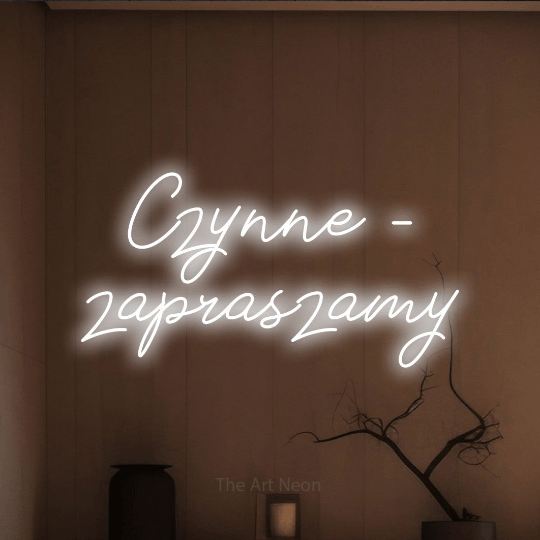 LED neon sign reading “Czynne – zapraszamy”, arranged in two lines.