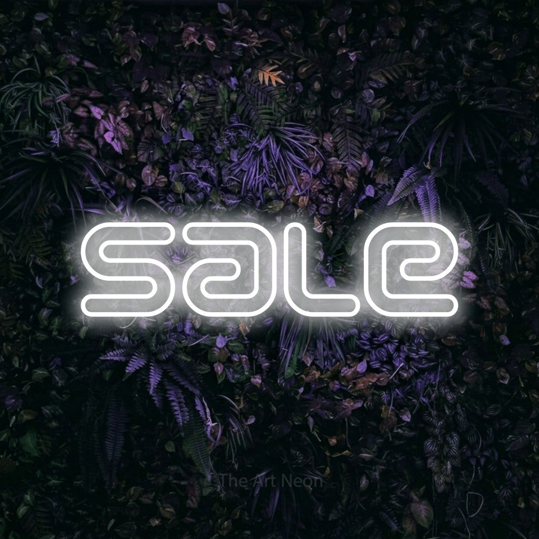 LED neon sign reading “sale”, arranged in a single line.