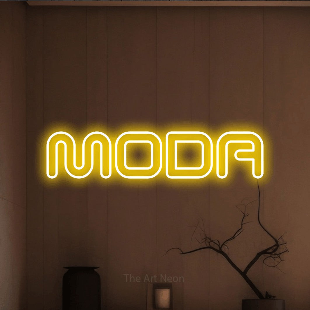 LED neon sign reading “MODA”, arranged in a single line.