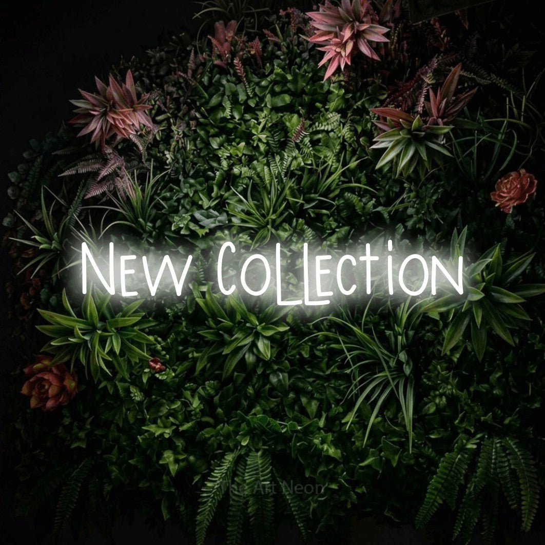 LED neon sign reading “New Collection”, arranged in a single line.