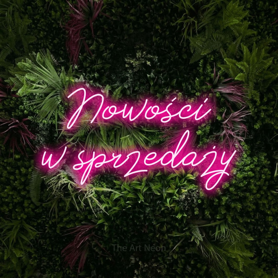 LED neon sign reading “Nowości w sprzedaży”, arranged in two lines.