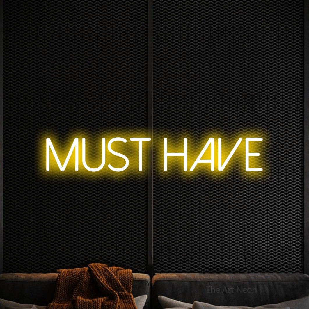 LED neon sign reading “Must Have”, arranged in a single line.