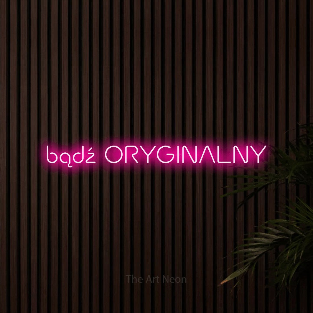 LED neon sign reading “bądź ORYGINALNY”, arranged in a single line.