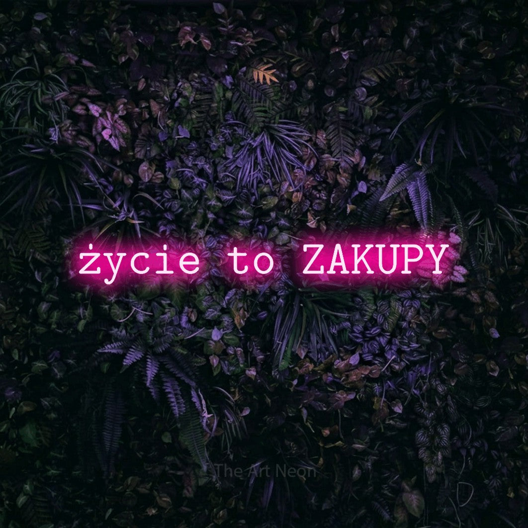 LED neon sign reading “życie to ZAKUPY”, arranged in a single line.