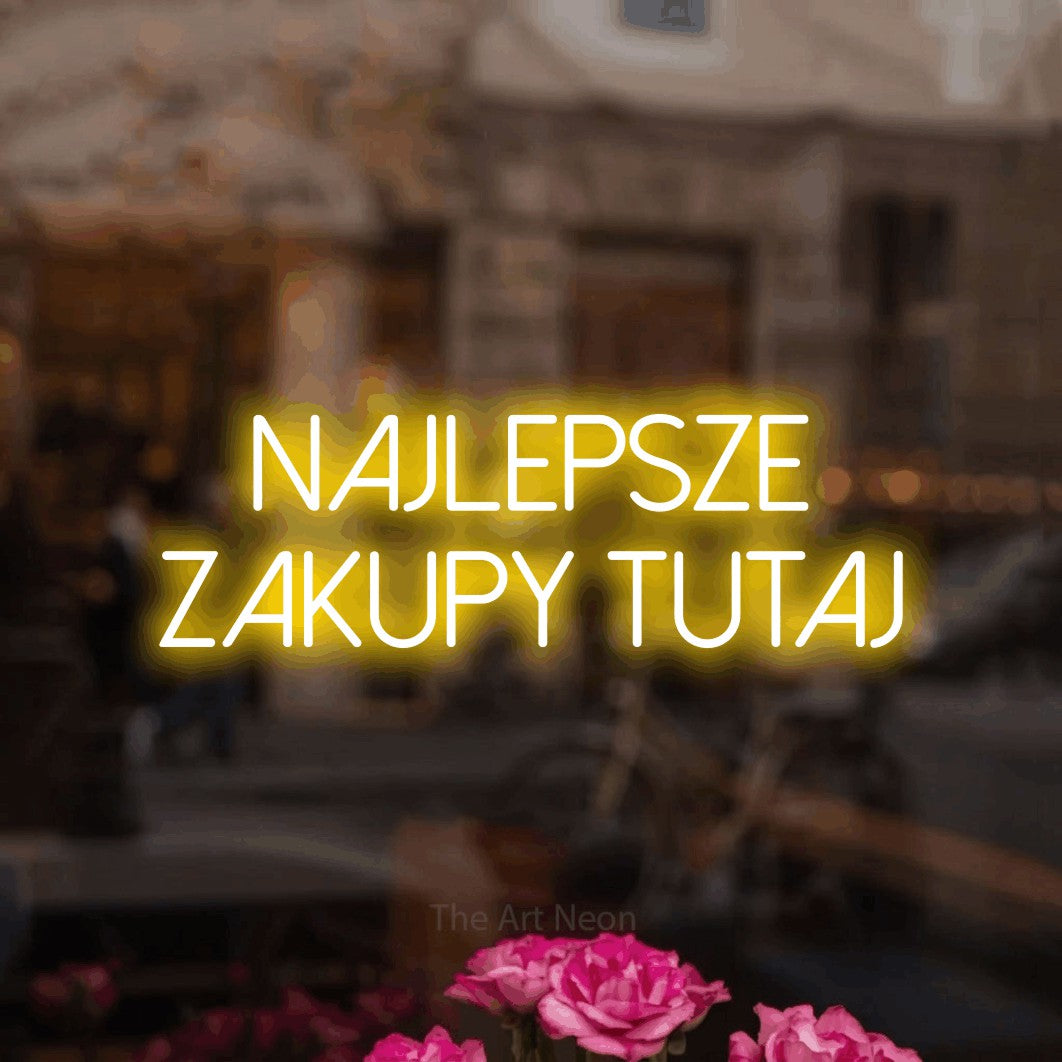LED neon sign reading “NAJLEPSZE ZAKUPY TUTAJ”, arranged in two lines.