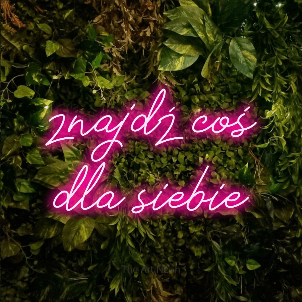 LED neon sign reading “znajdź coś dla siebie”, arranged in two lines.