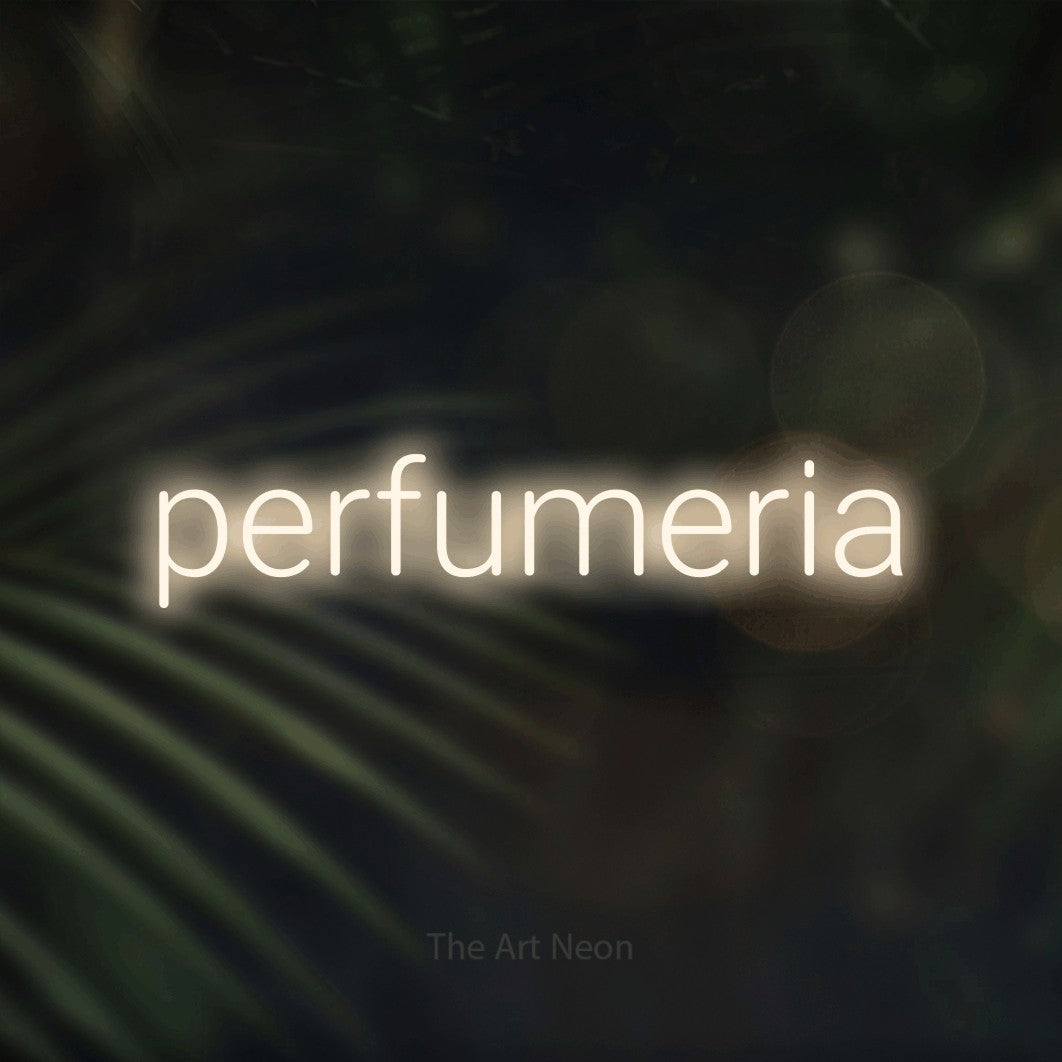 LED neon sign reading “perfumeria”, arranged in a single line.