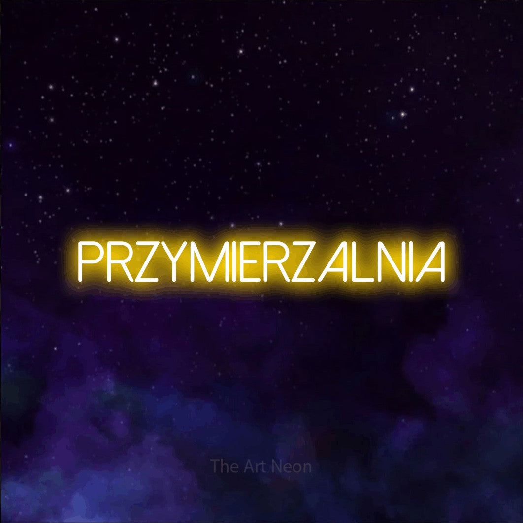 LED neon sign reading “przymierzalnia”, arranged in a single line.