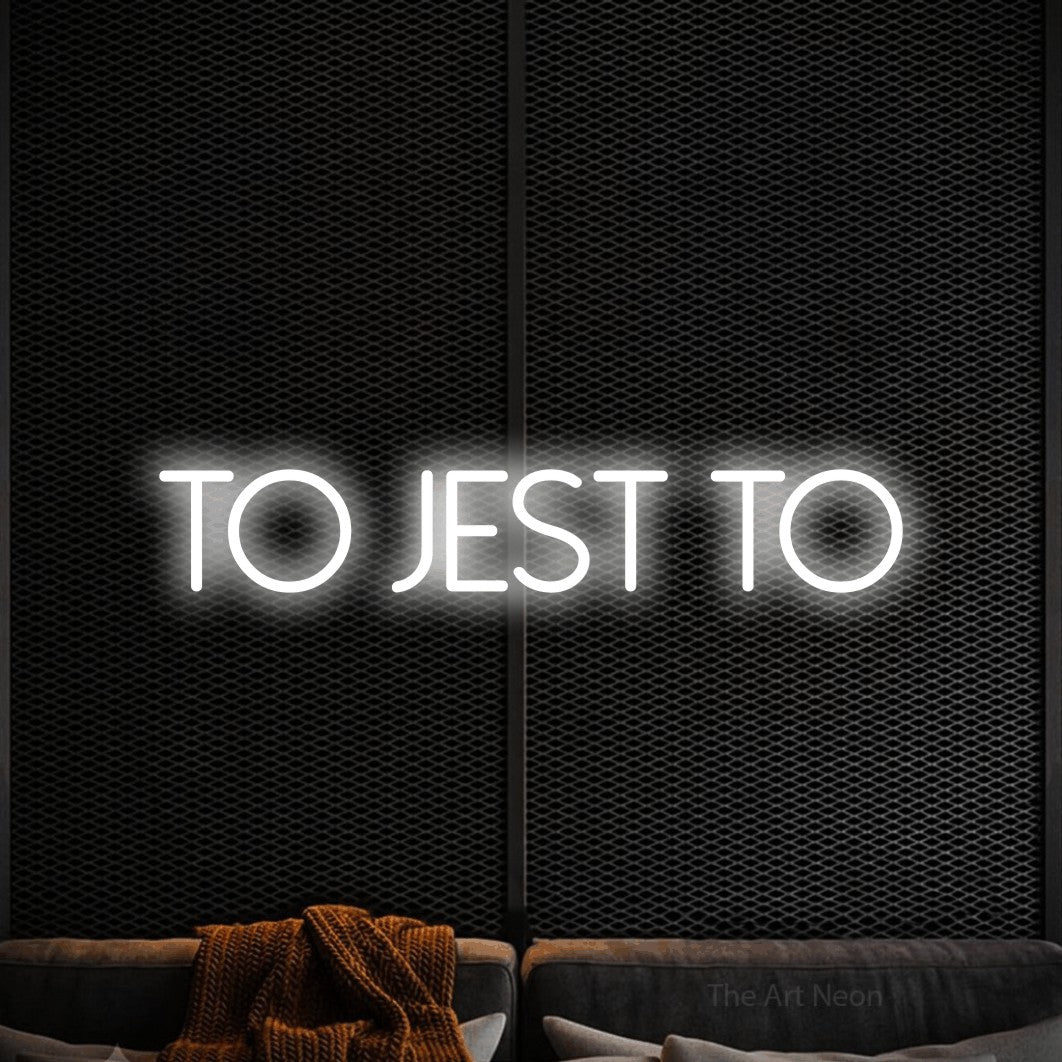 LED neon sign reading “to JEST to”, arranged in a single line.