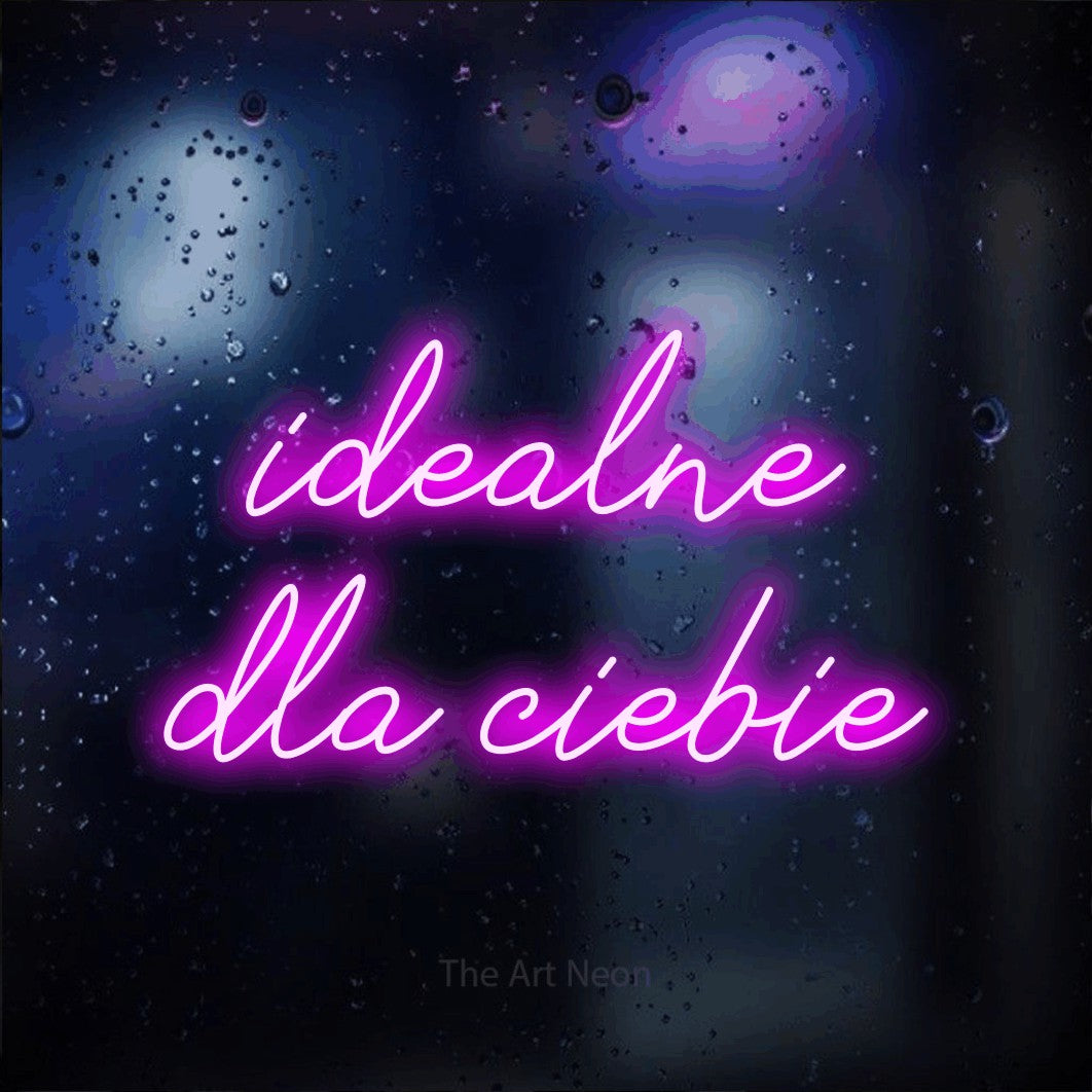 LED neon sign reading “idealne dla ciebie”, arranged in two lines.