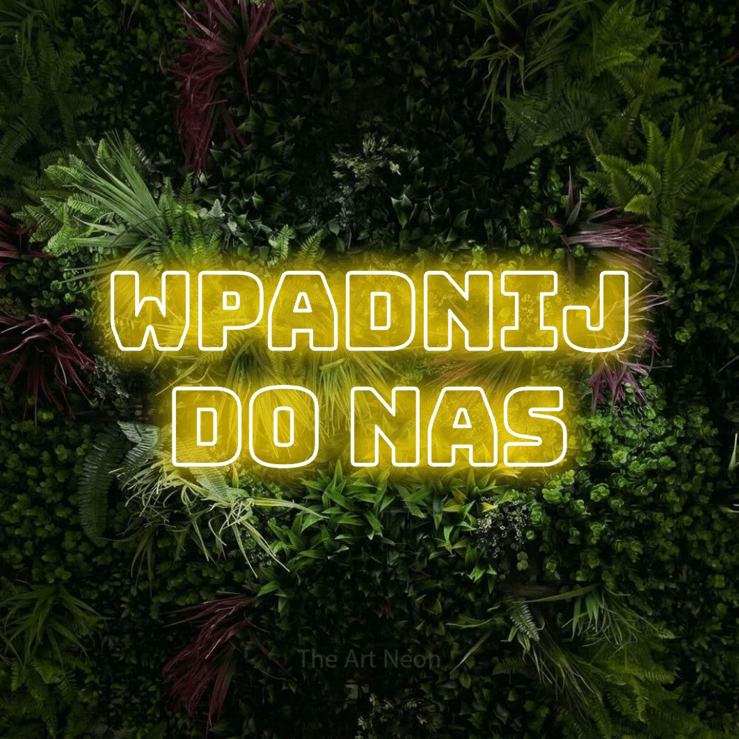 LED neon sign reading “Wpadnij do nas”, arranged in two lines.