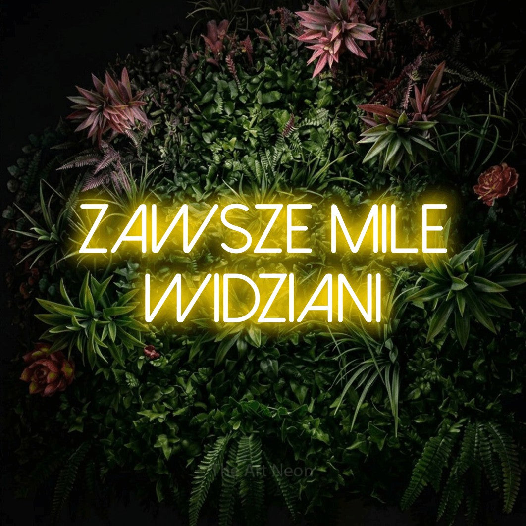 LED neon sign reading “Zawsze mile widziani”, arranged in two lines.