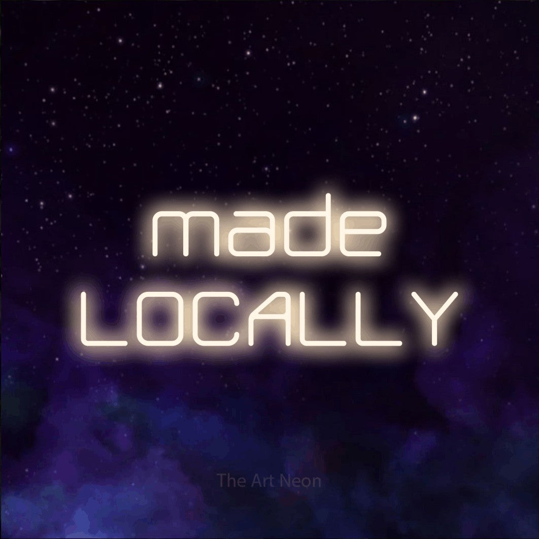 LED neon sign reading “made LOCALLY”, arranged in two lines.