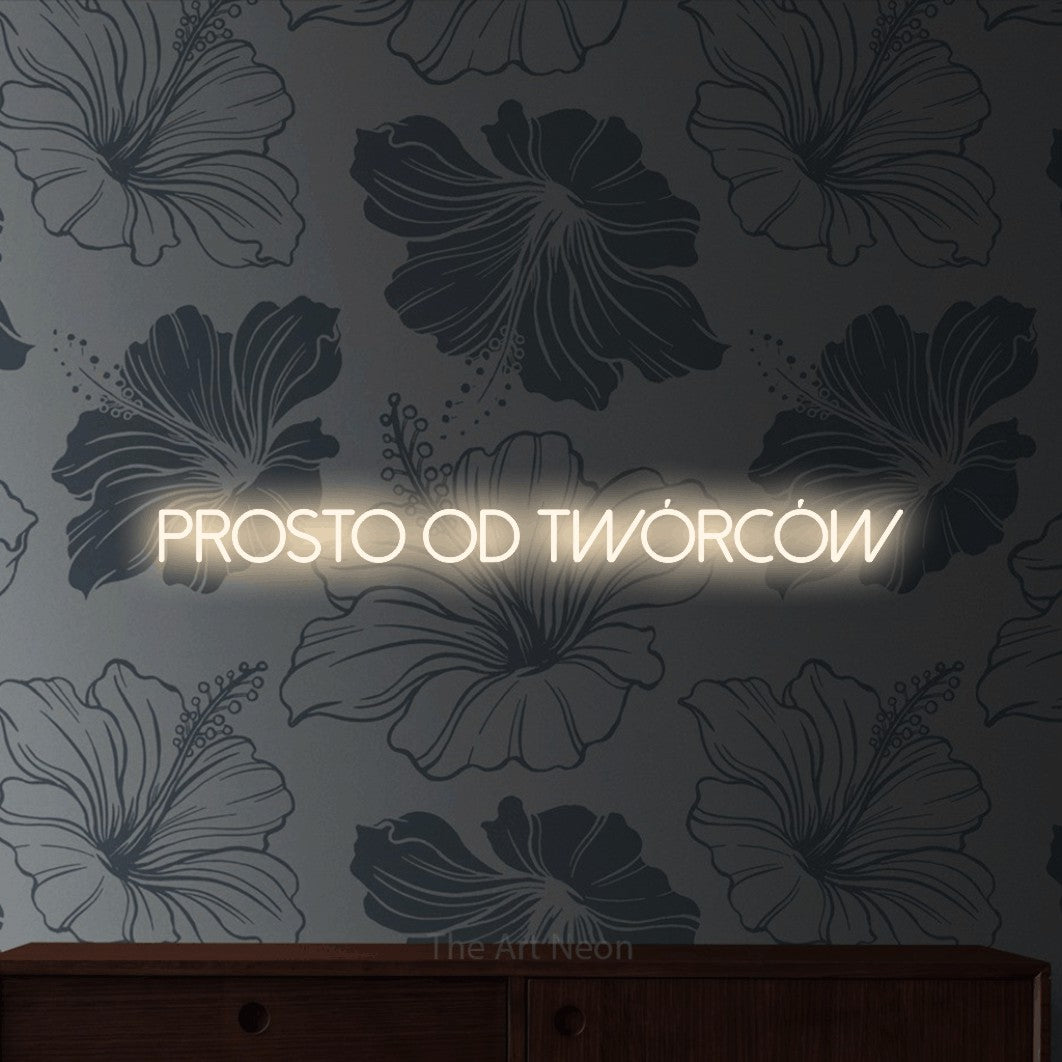 LED neon sign reading “prosto od twórców”, arranged in a single line.