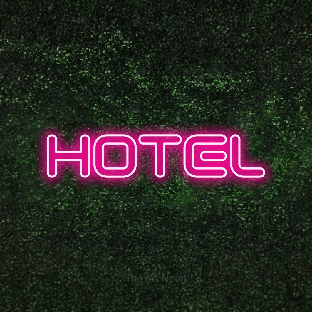 LED neon sign reading “HOTEL”, arranged in a single line.