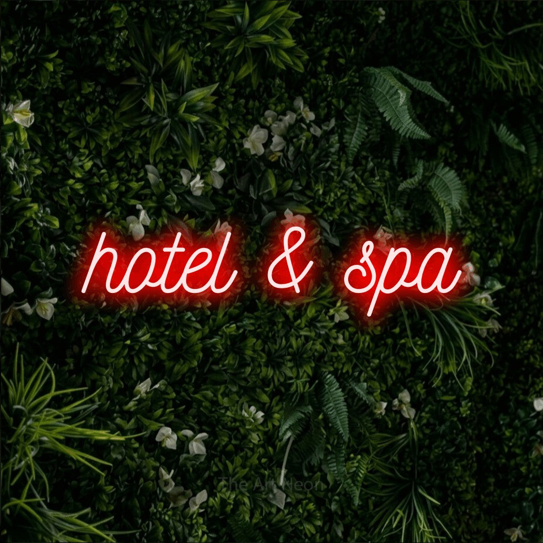 LED neon sign reading “hotel & spa”, arranged in a single line.