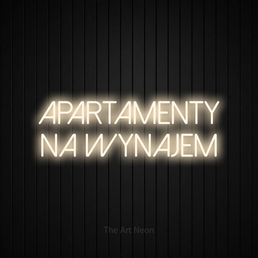 LED neon sign reading “APARTAMENTY NA WYNAJEM”, arranged in two lines.