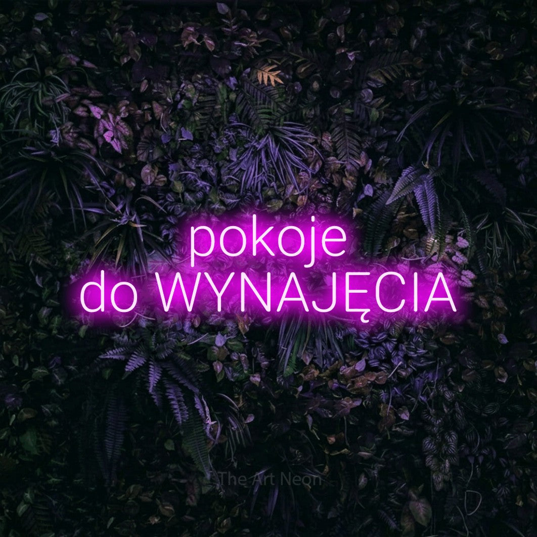 LED neon sign reading “pokoje do WYNAJĘCIA”, arranged in two lines.
