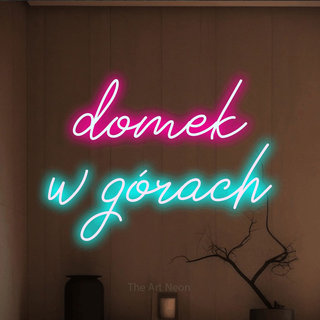 LED neon sign reading “domek w górach”, arranged in two lines.