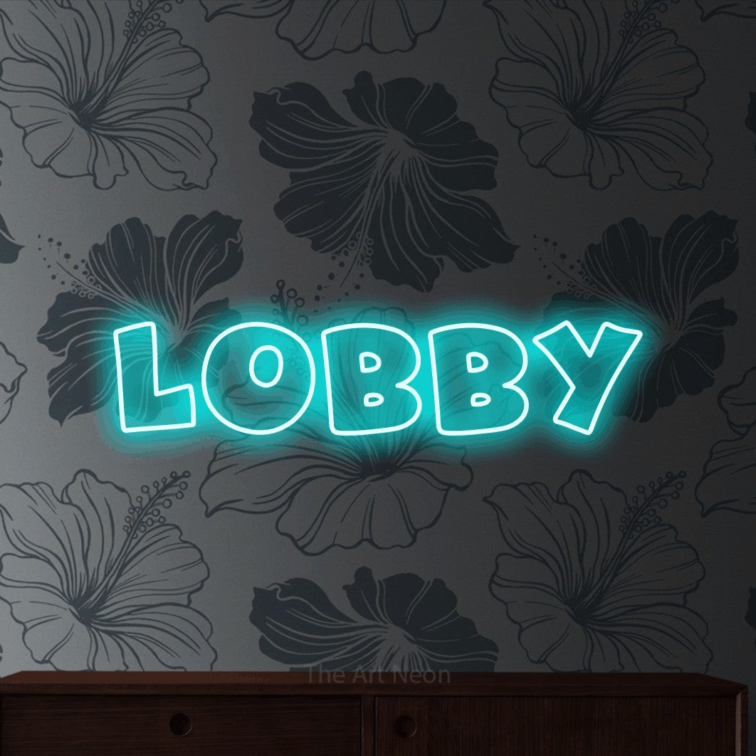 LED neon sign reading “lobby”, arranged in a single line.