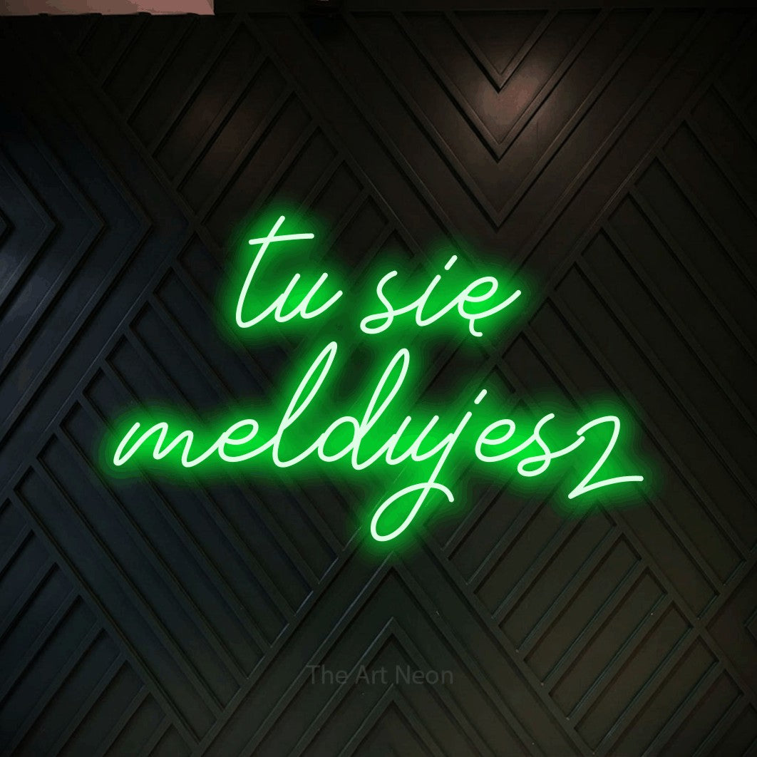 LED neon sign reading “tu się meldujesz”, arranged in two lines.