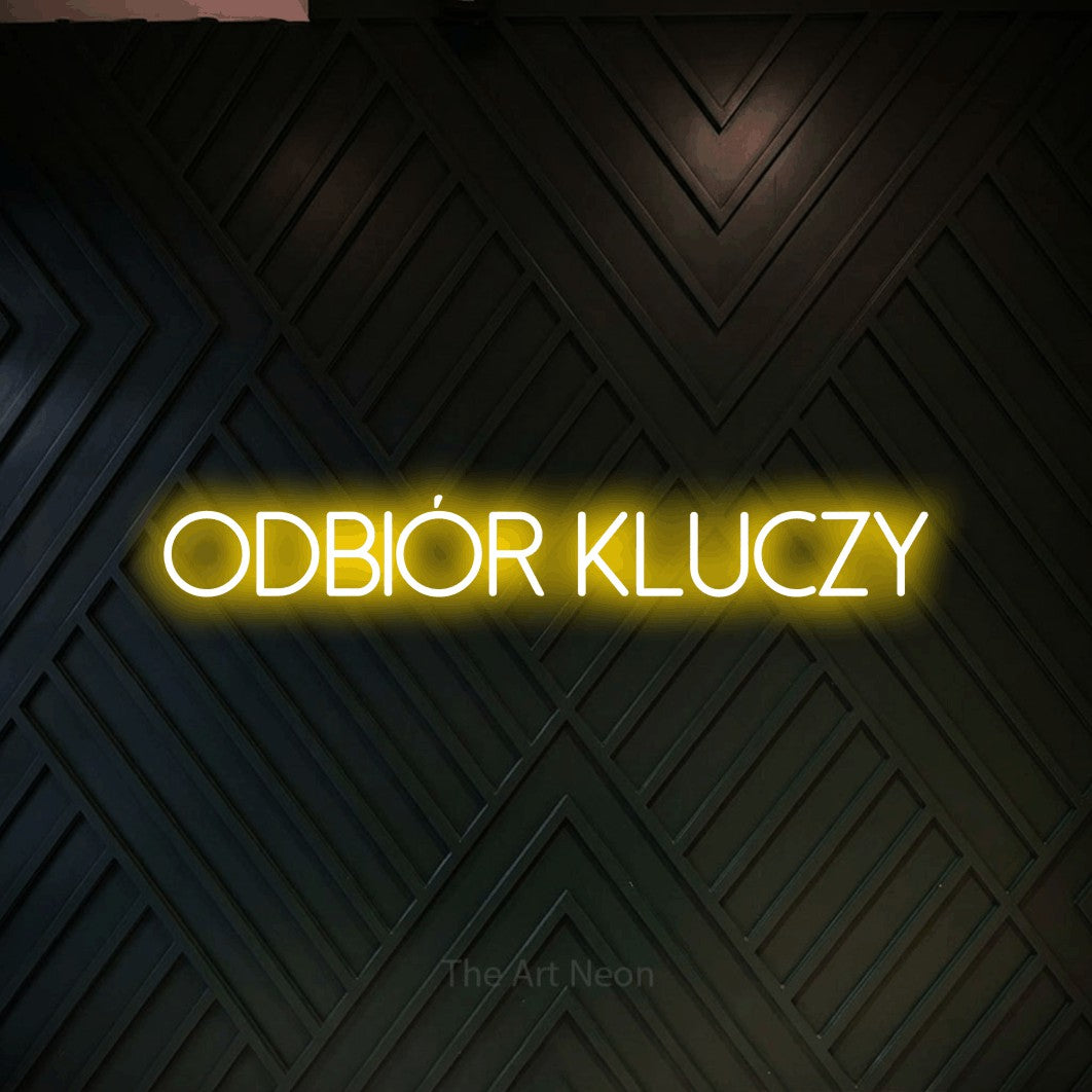 LED neon sign reading “Odbiór Kluczy”, arranged in a single line.