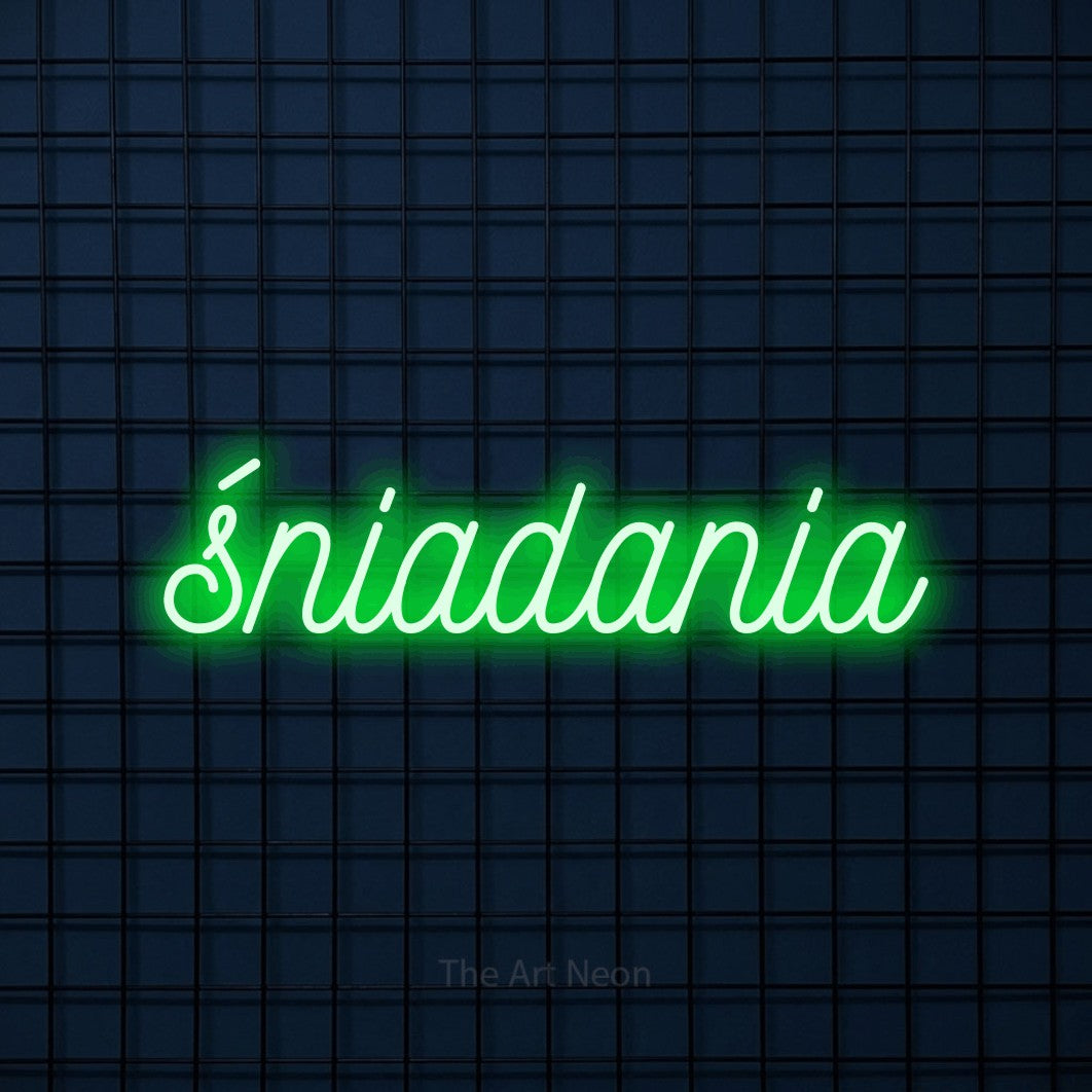 LED neon sign reading “śniadania”, arranged in a single line.