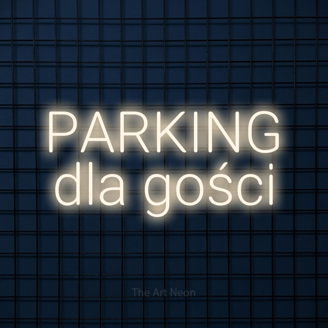 LED neon sign reading “PARKING dla gości”, arranged in two lines.