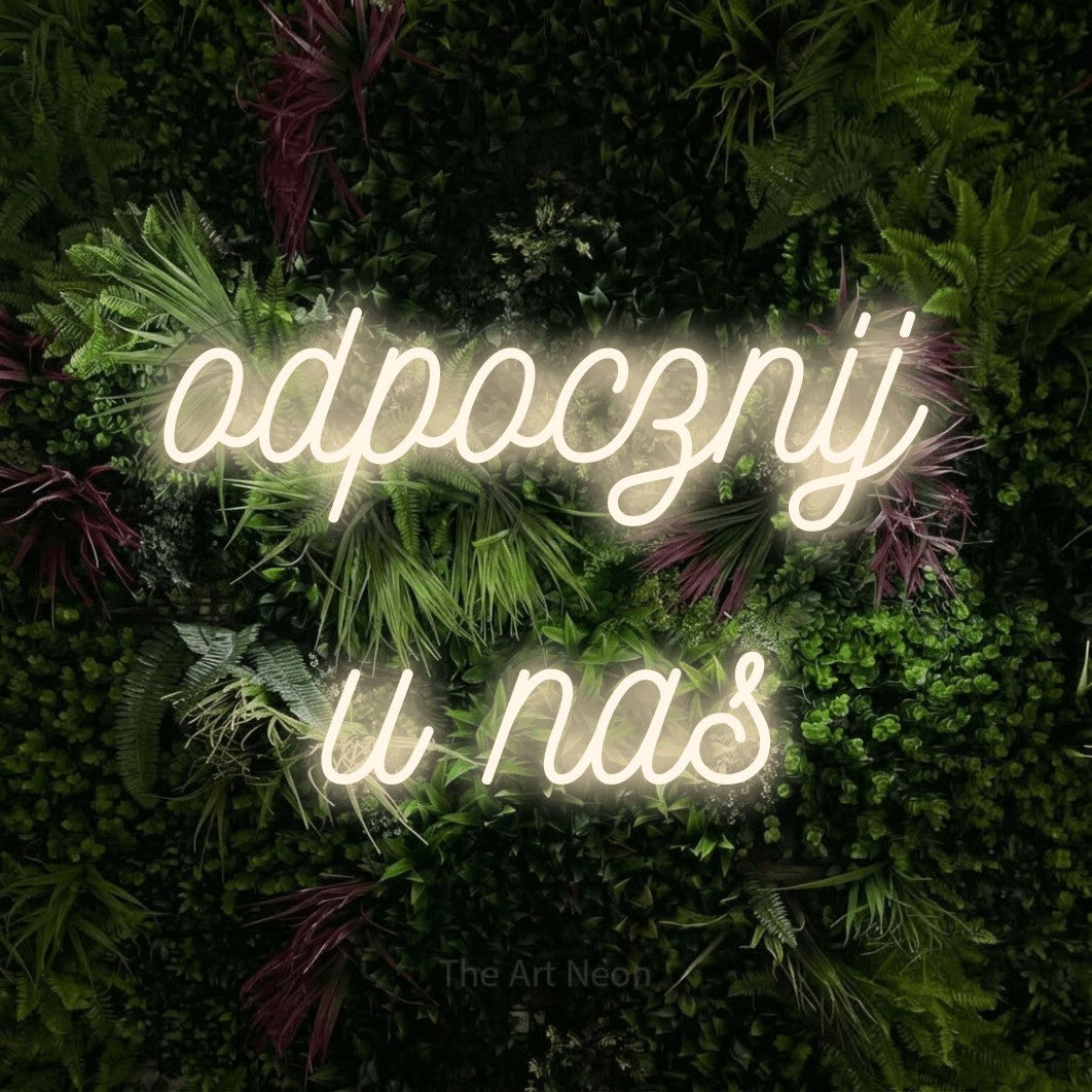 LED neon sign reading “odpocznij u nas”, arranged in two lines.