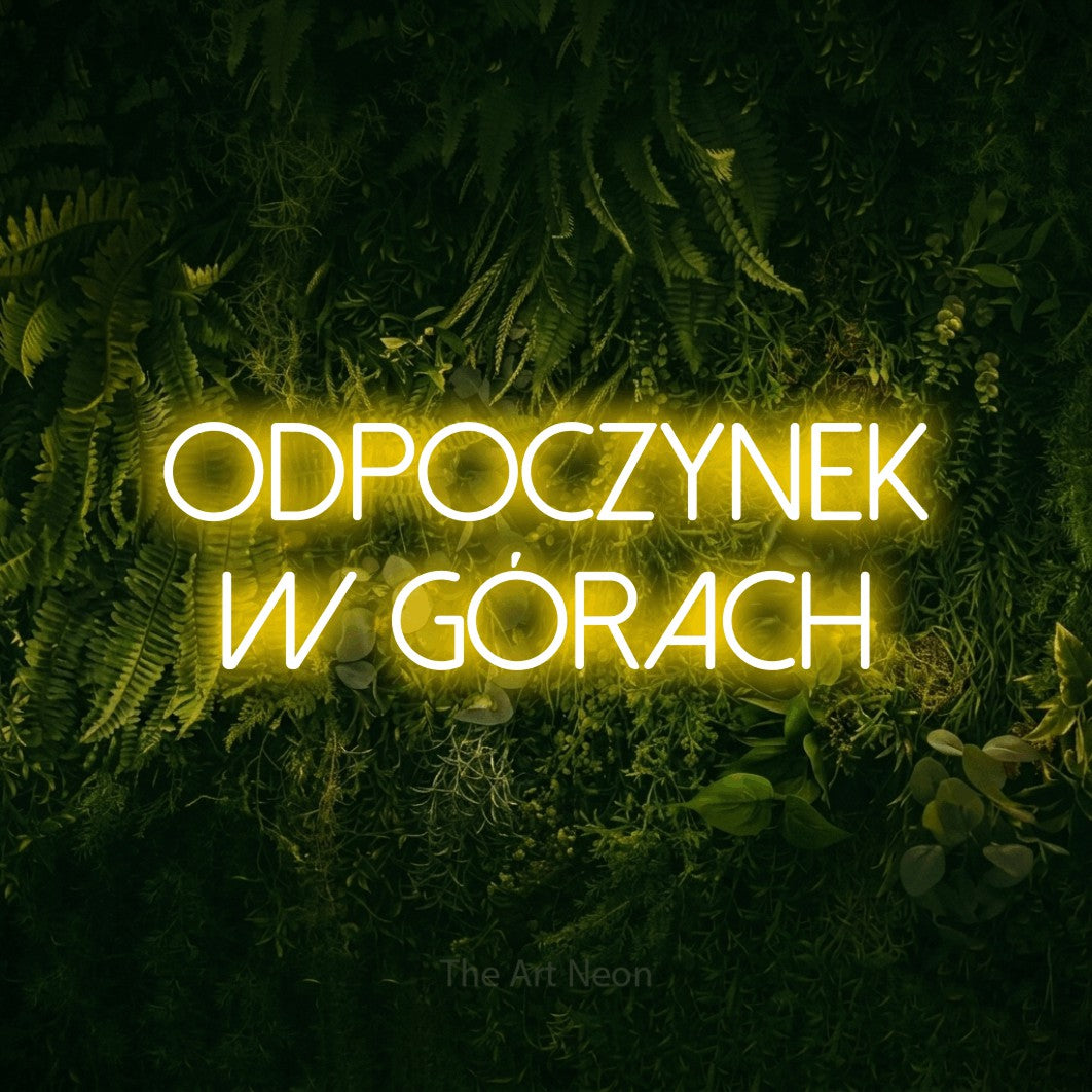 LED neon sign reading “ODPOCZYNEK W GÓRACH”, arranged in two lines.