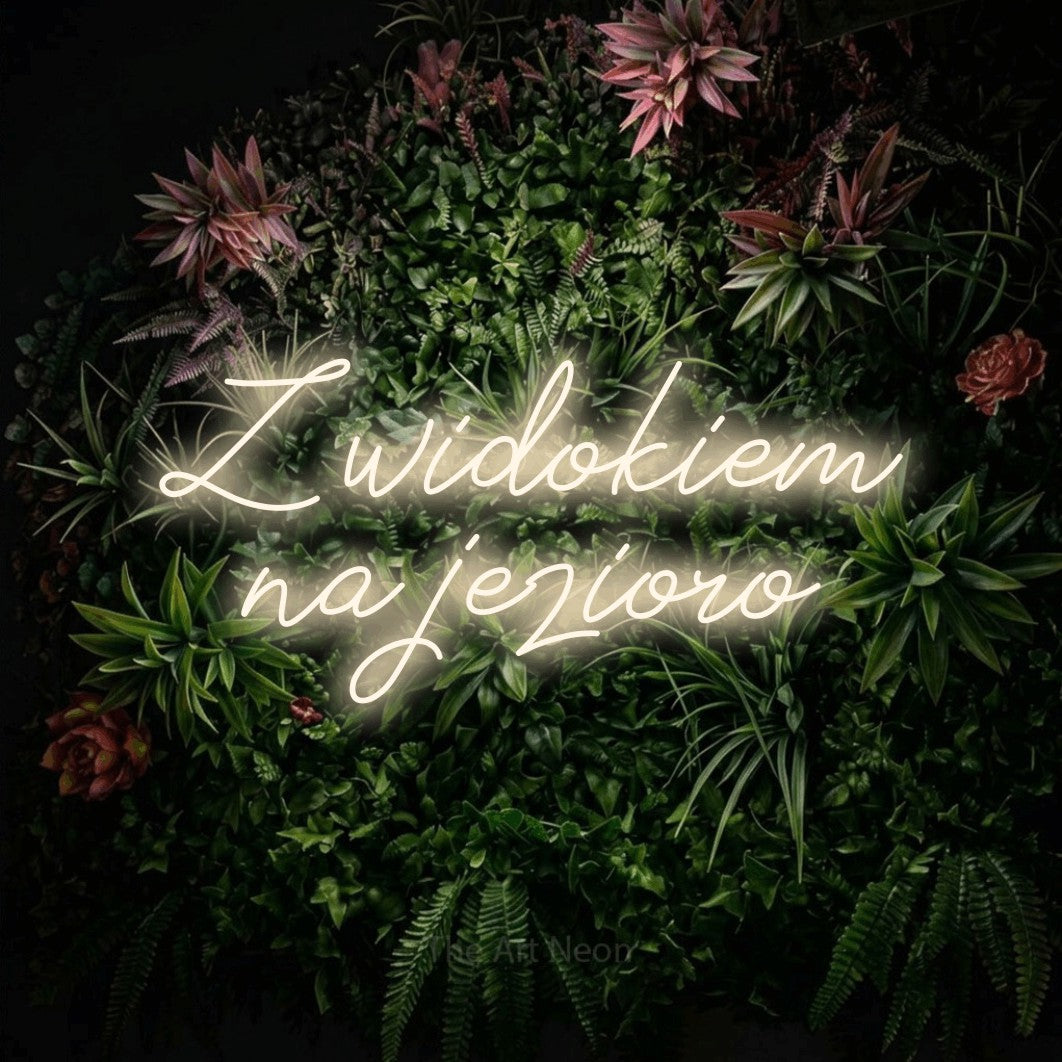 LED neon sign reading “Z widokiem na jezioro”, arranged in two lines.