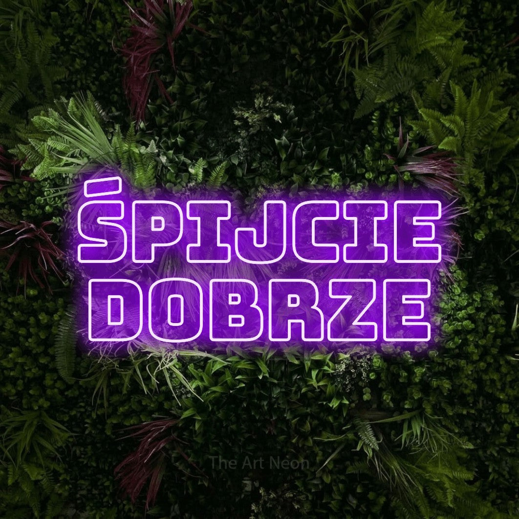 LED neon sign reading “ŚPIJCIE DOBRZE”, arranged in two lines.
